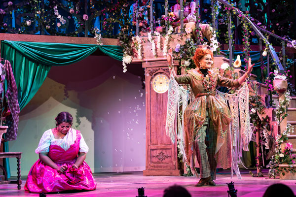 ornately decorated stage showing Cinderella and her fairy godmother